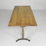 Art Deco bistro table with oak top on cast iron table