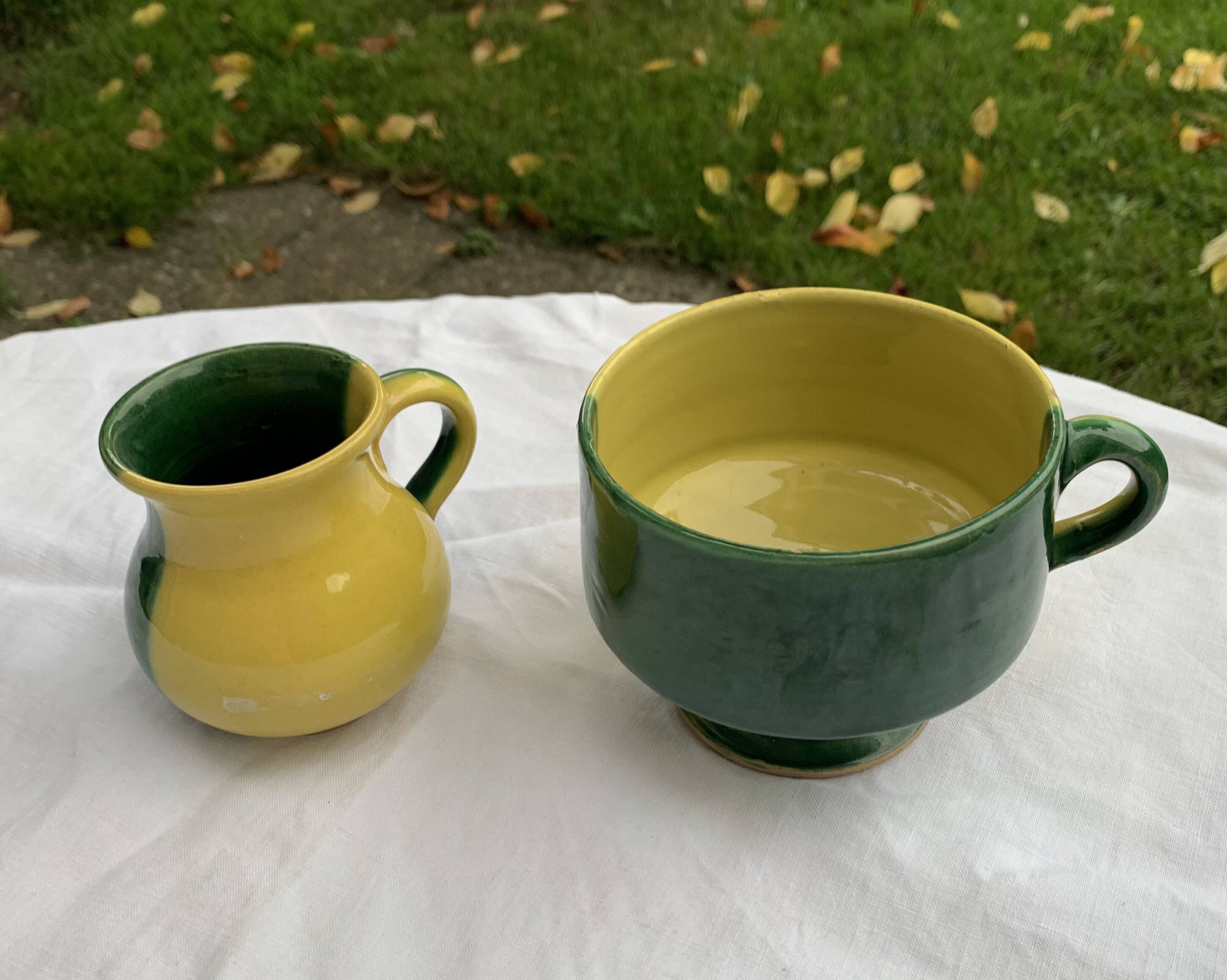 Enameled ceramic bowl and milk jug, two-tone yellow and green, vintage 1950