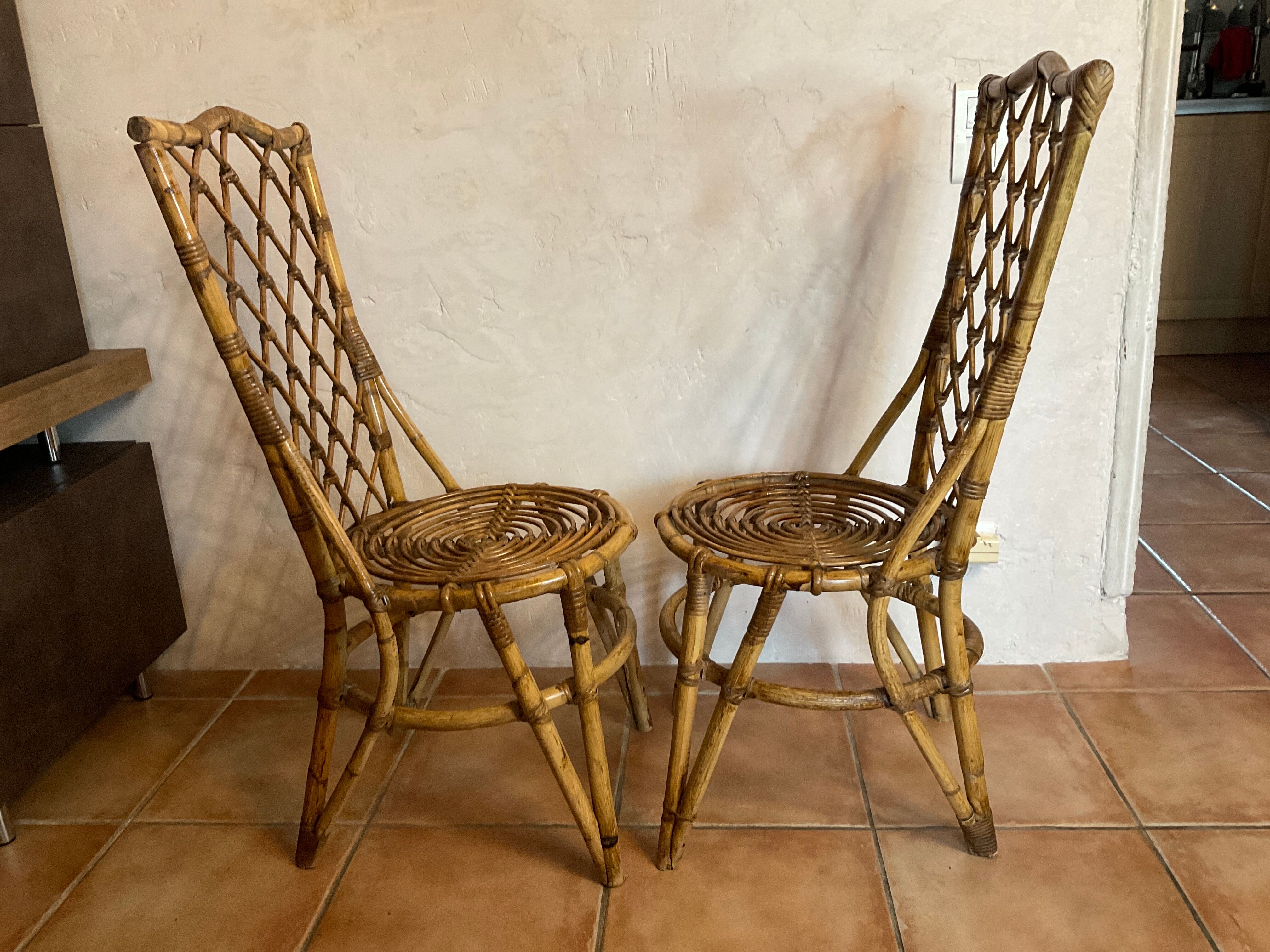 Pair of vintage rattan chairs Louis Sognot