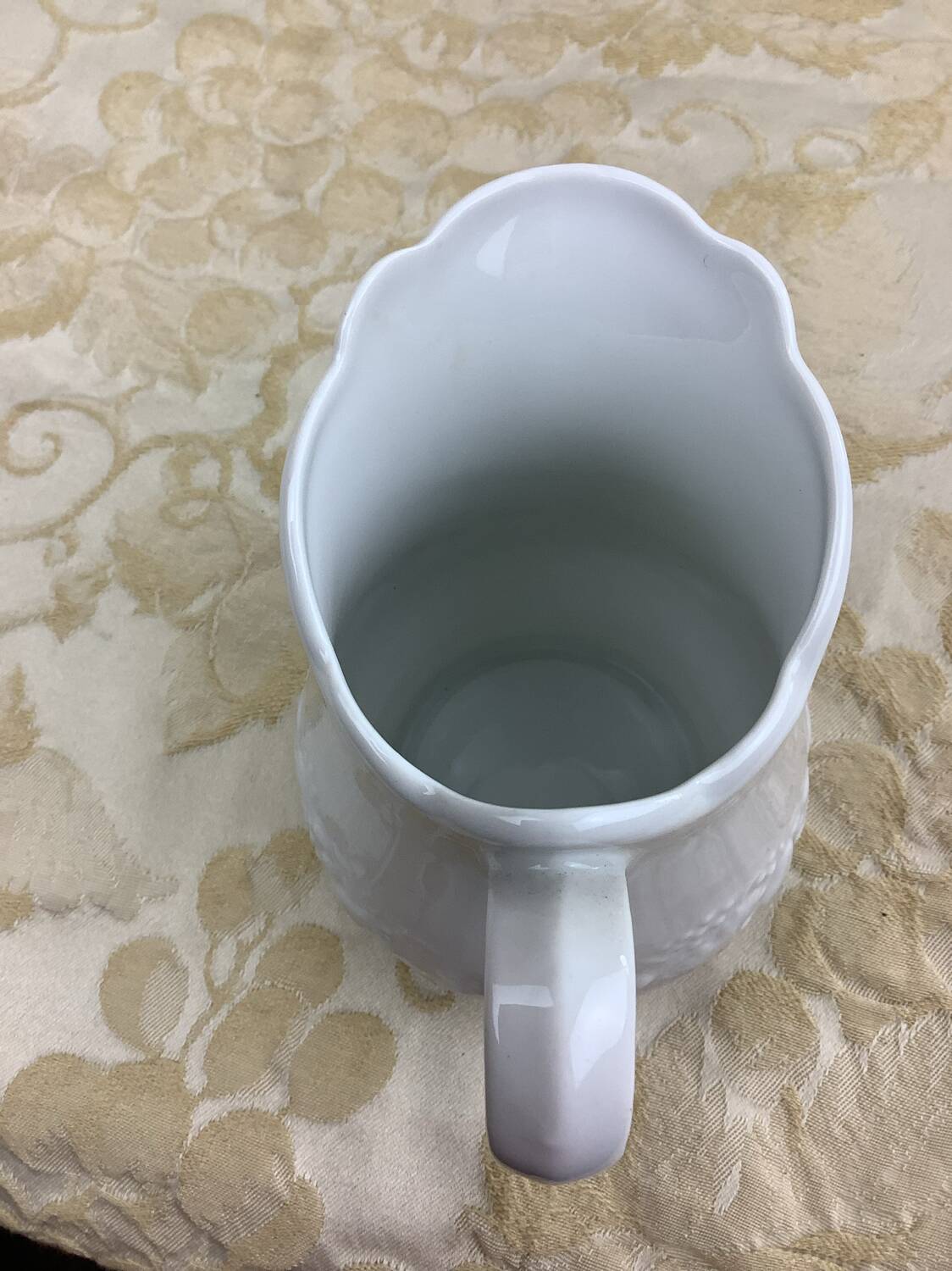 Small white porcelain milk jug