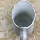 Small white porcelain milk jug