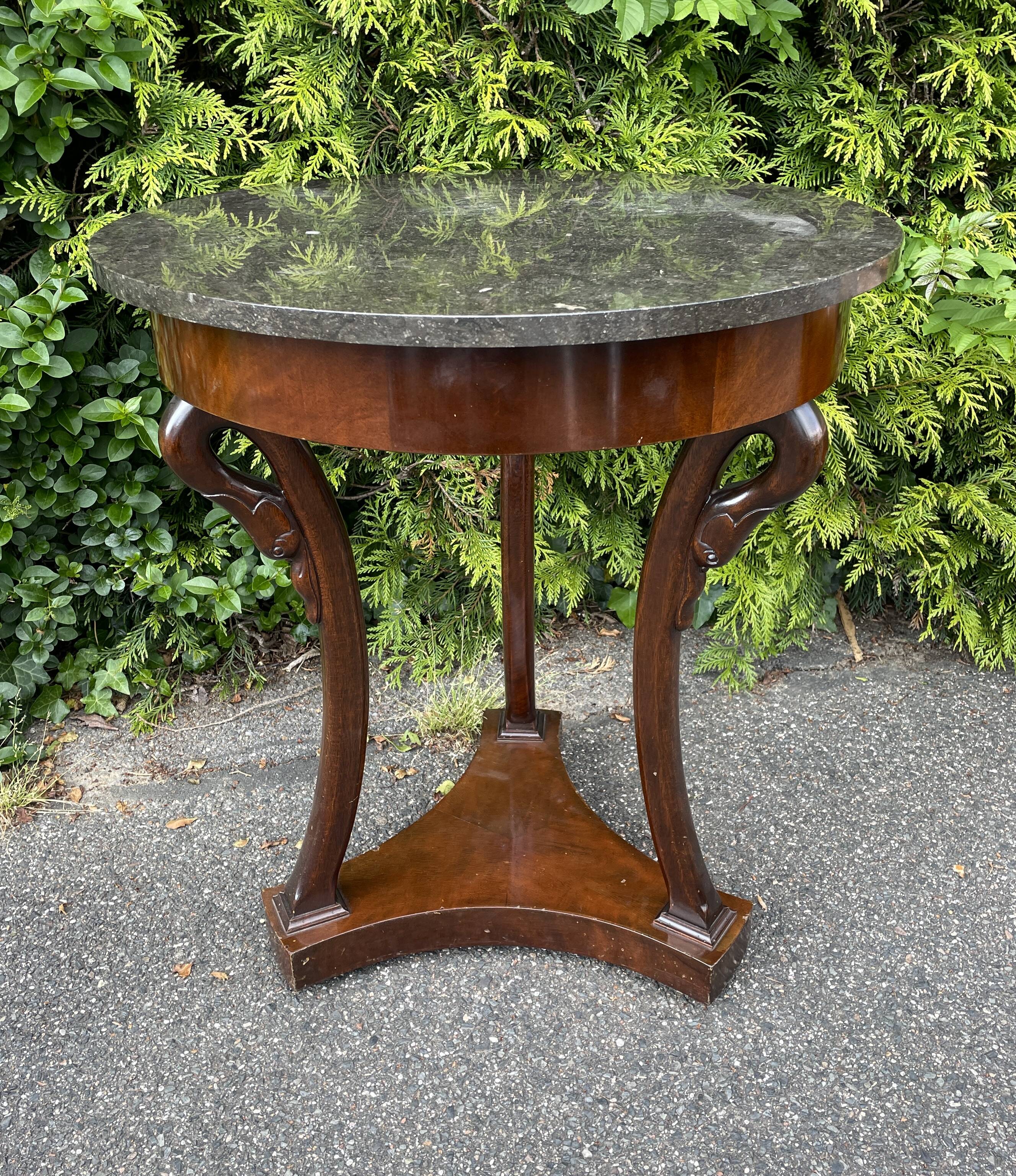 Empire style pedestal table with gooseneck, marble top.
