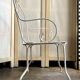 Fauteuil de jardin en fer forgé blanc