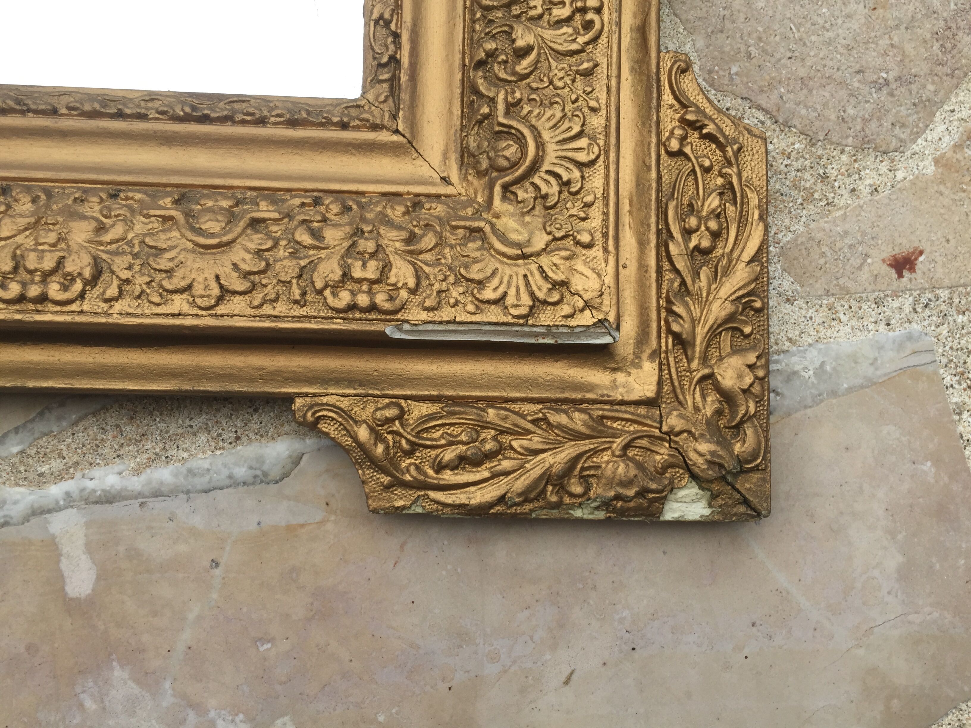 Old mirror in gilded wood and stucco 120 x 85 cm