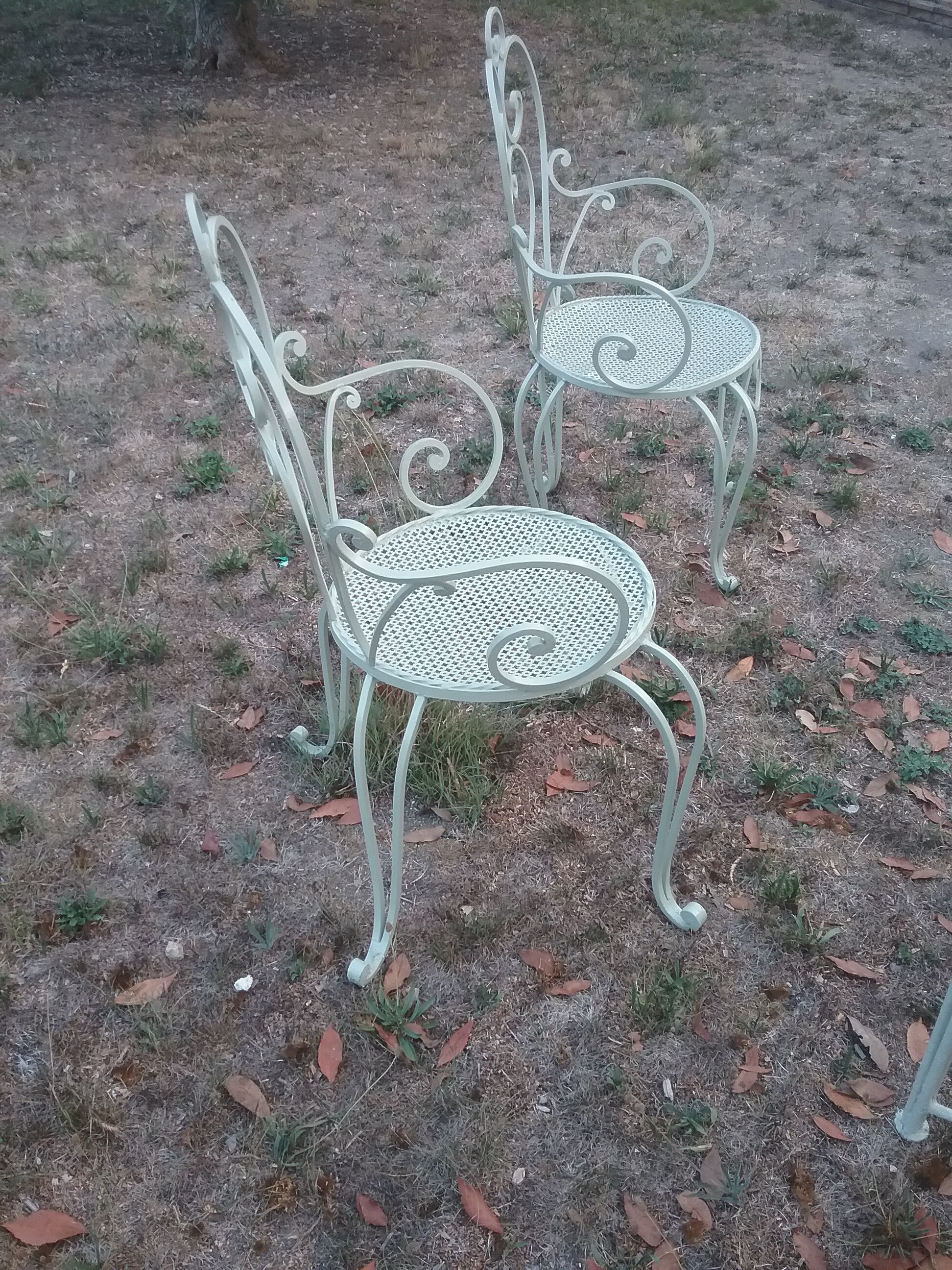 Garden furniture in green wrought iron