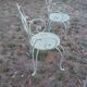 Garden furniture in green wrought iron