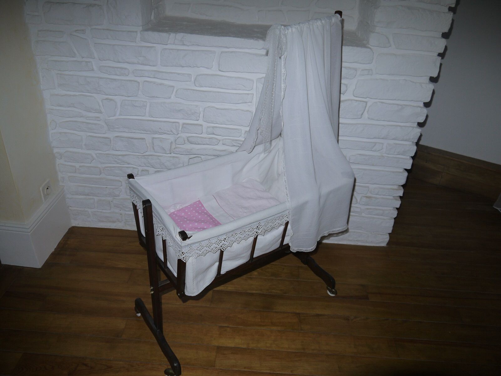 Former cradle swing and bars on wheels