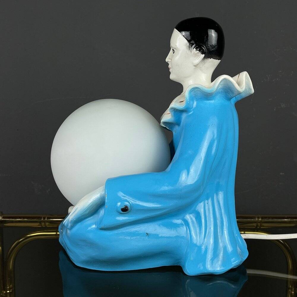 Mid-century Italian Pierrot table lamp in blue ceramic, 1960s.