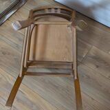 Antique patinated wooden bistro chair from the early 20th century.