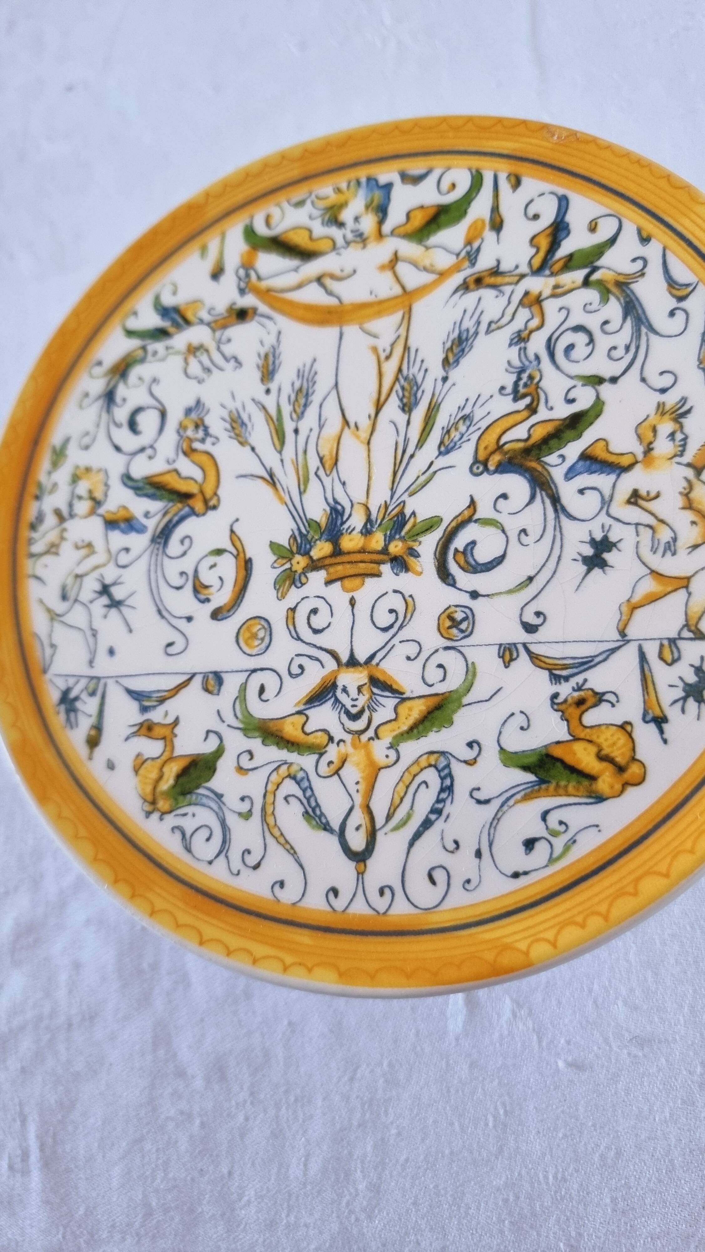 Vintage Italian raised plate in hand-painted ceramic.