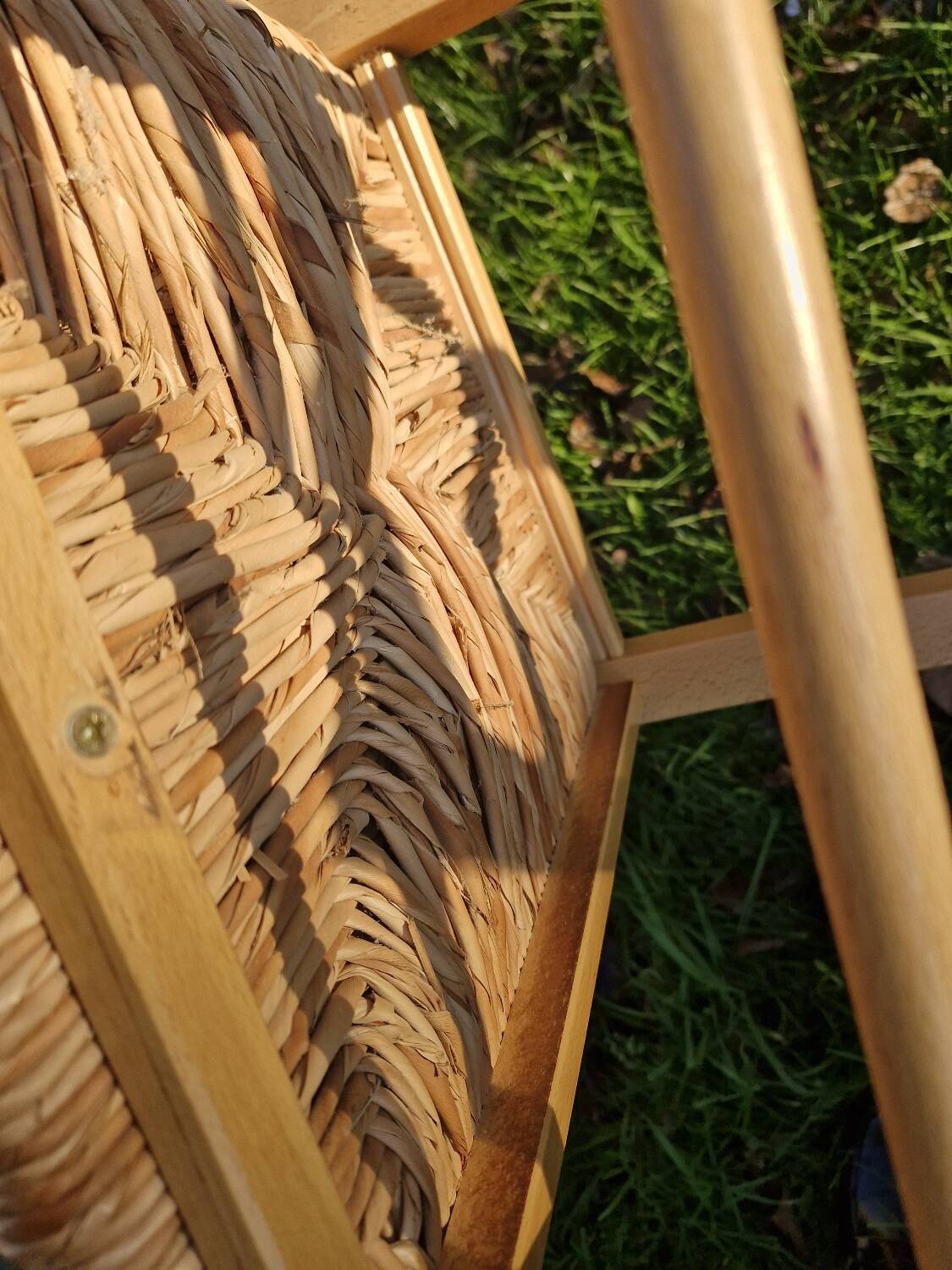 Pair of wooden and straw chairs