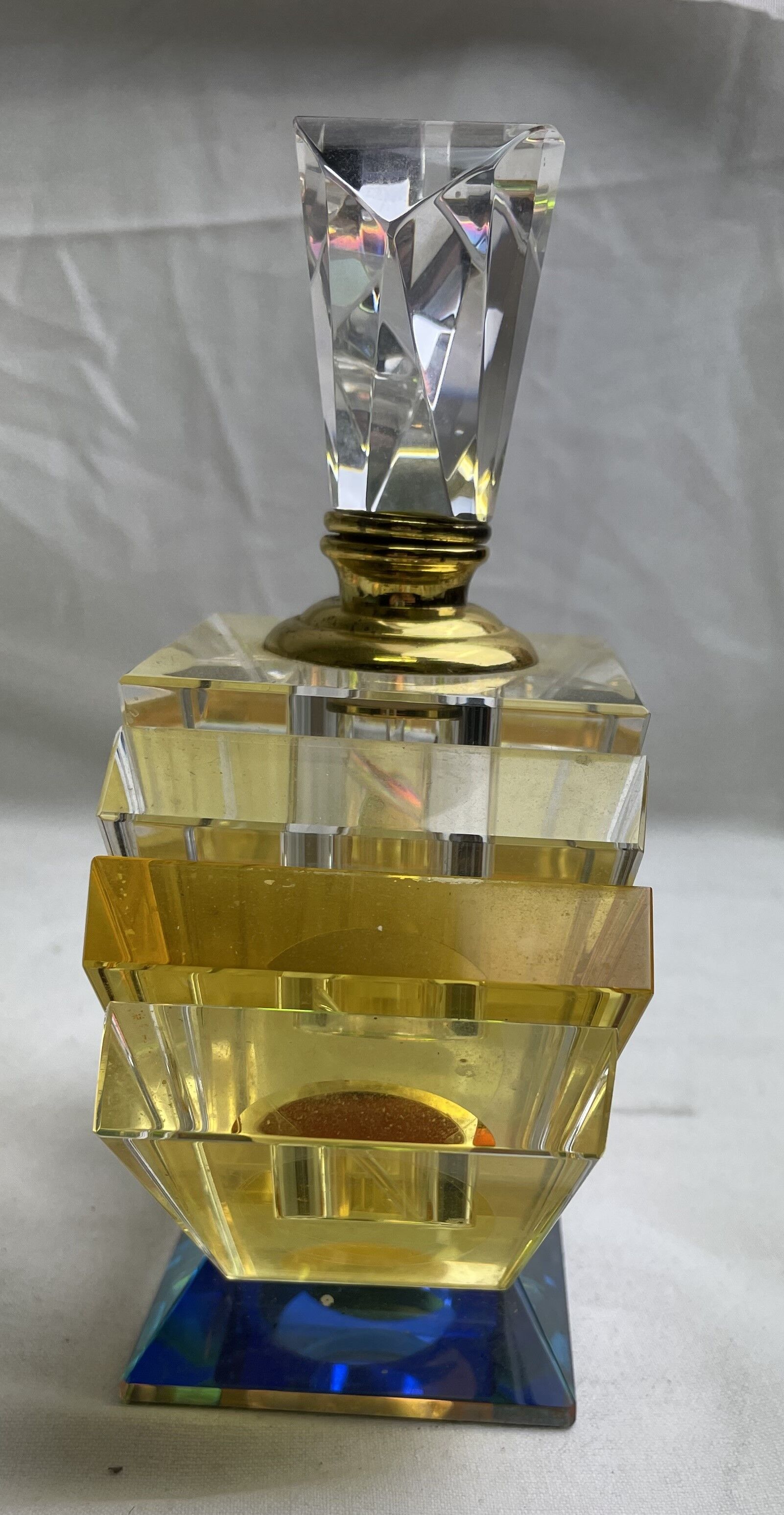 Empty art deco perfume bottle in amber crystal