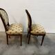 Pair of Louis XVI medallion chairs with canvas.