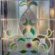 Late 19th century store doors, haberdashery front with Art Nouveau stained glass windows