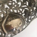 Silver metal basket with floral decoration