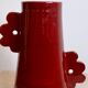 Handmade abstract ceramic vase with asymmetrical handles and burgundy flower