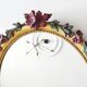 Miroir en bois doré avec fleurs