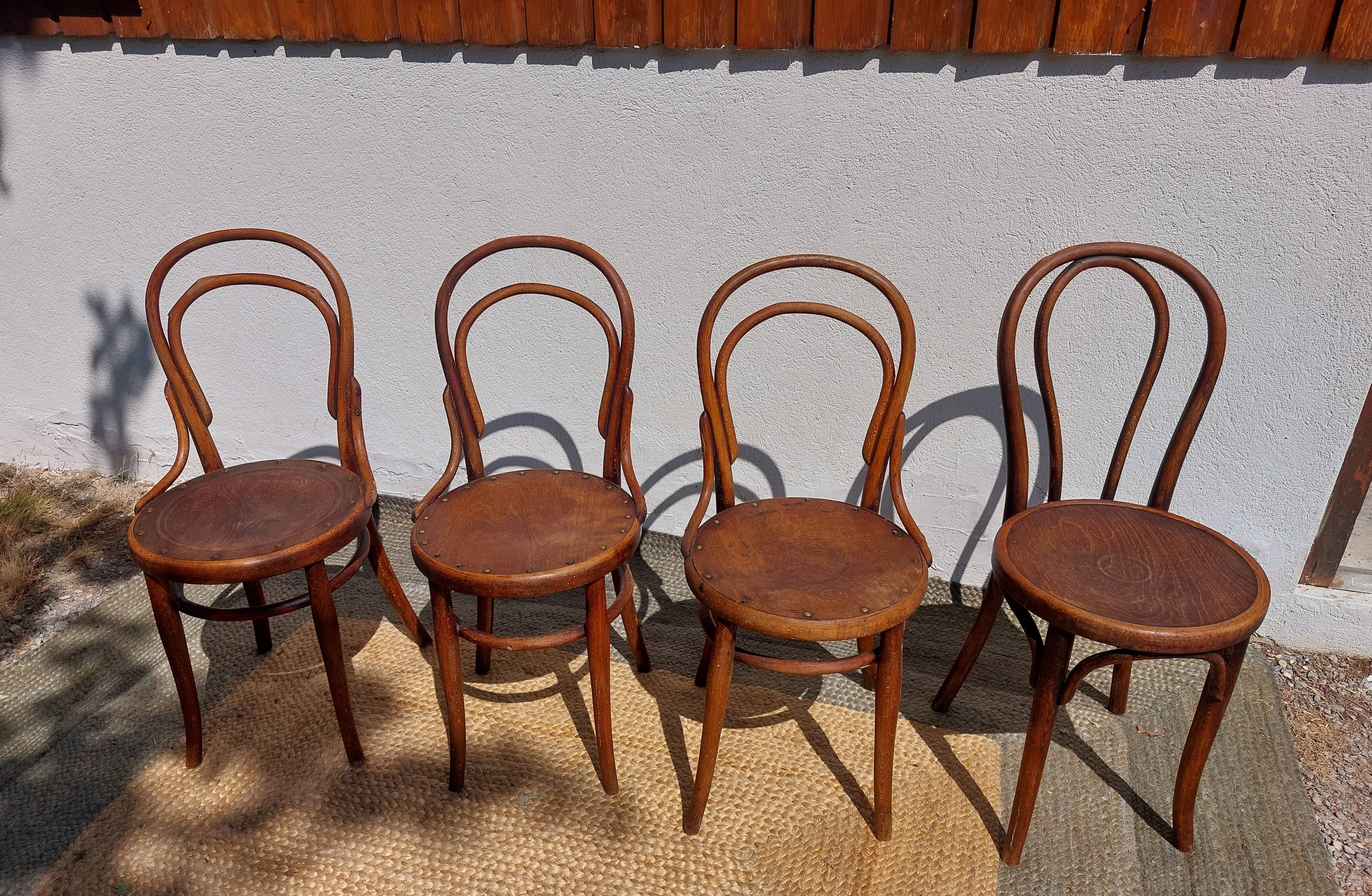 4 curved wooden bistro chairs