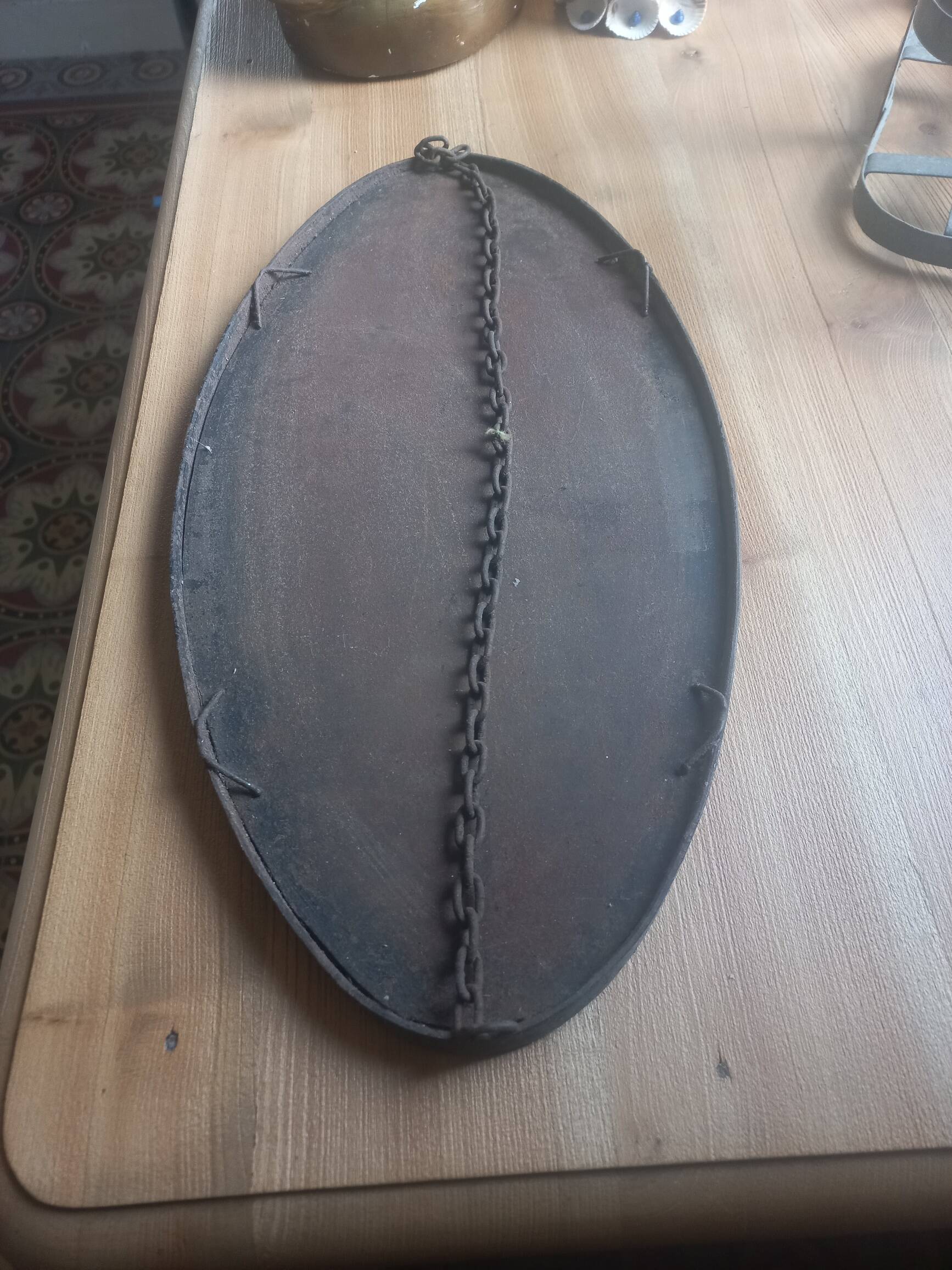 Antique free-form metal mirror