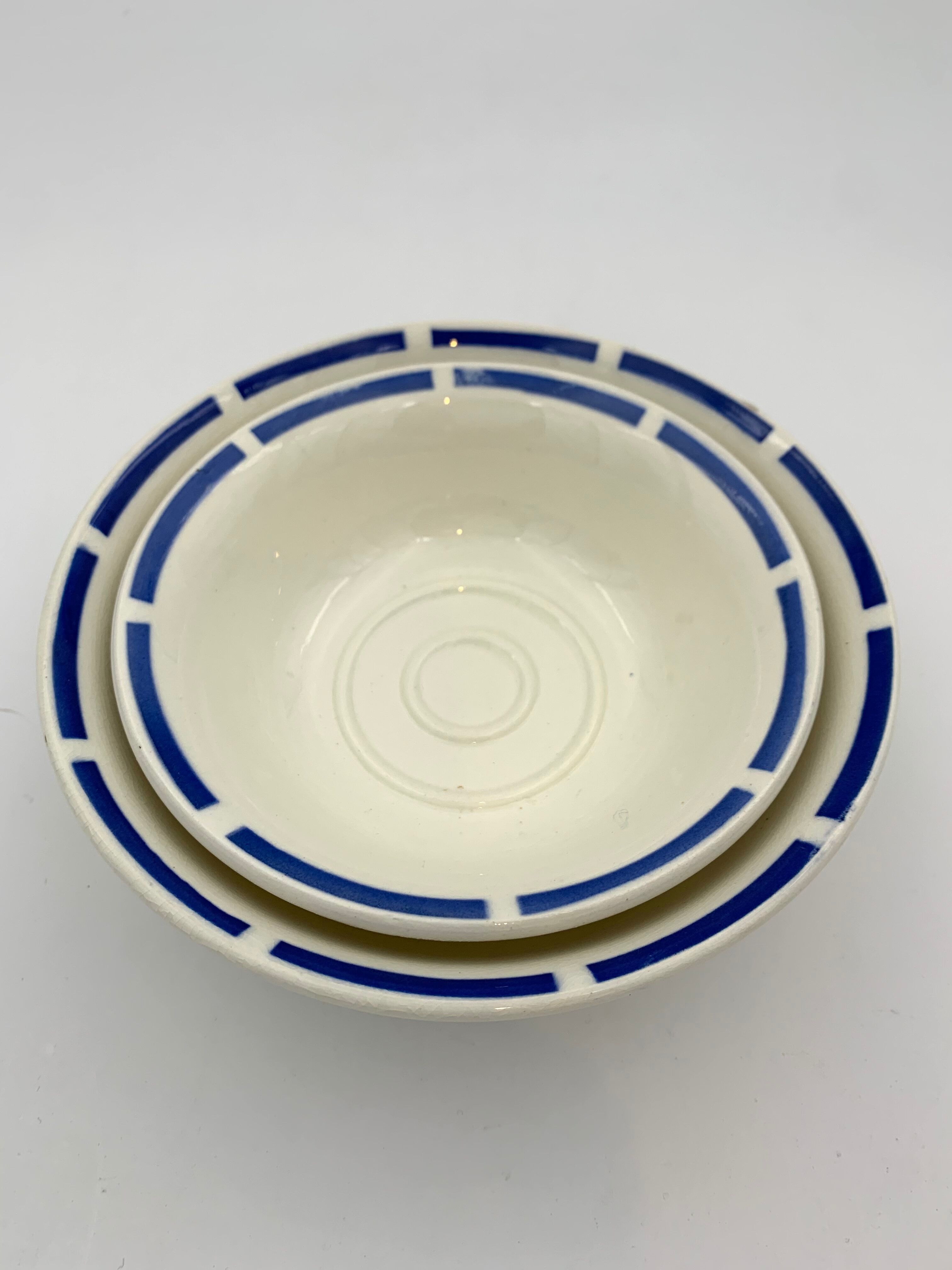 Two vintage cups in white earthenware, blue ledé 1950