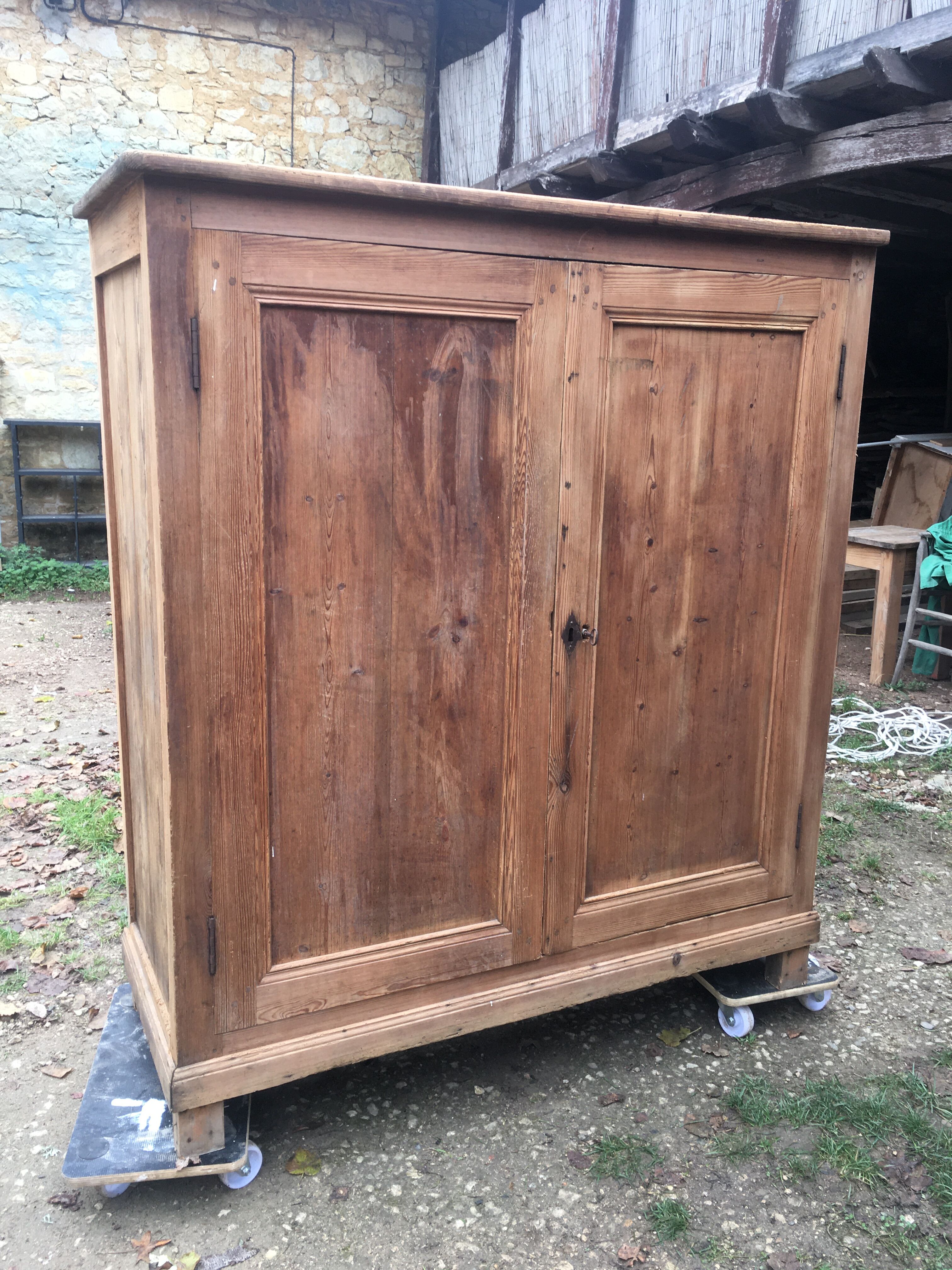 Wooden cabinet with interior doors