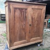 Wooden cabinet with interior doors