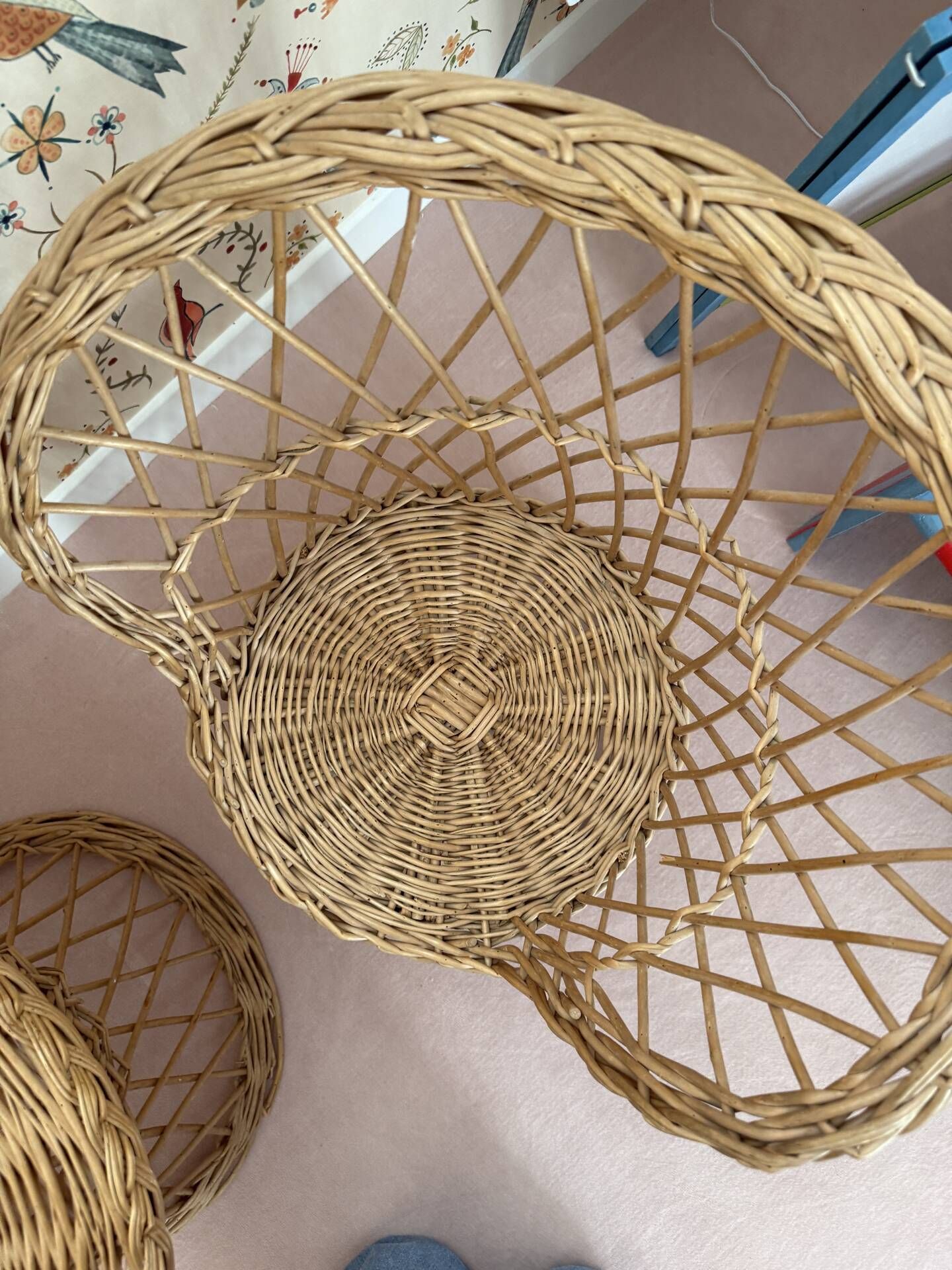 Table and two wicker chairs for children.