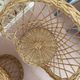 Table and two wicker chairs for children.