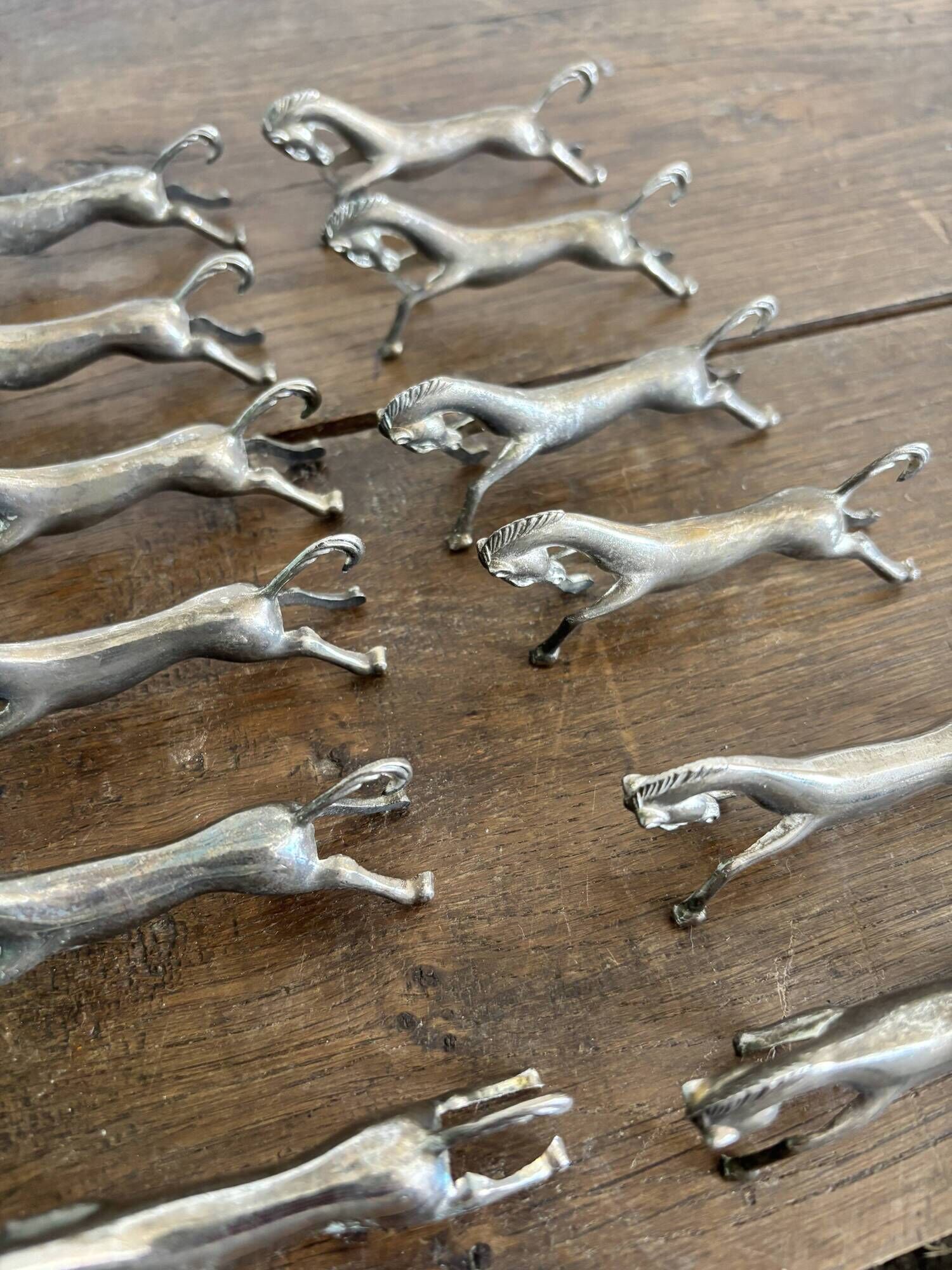 Set of 12 vintage horse galloping knife rests – Silver-plated metal