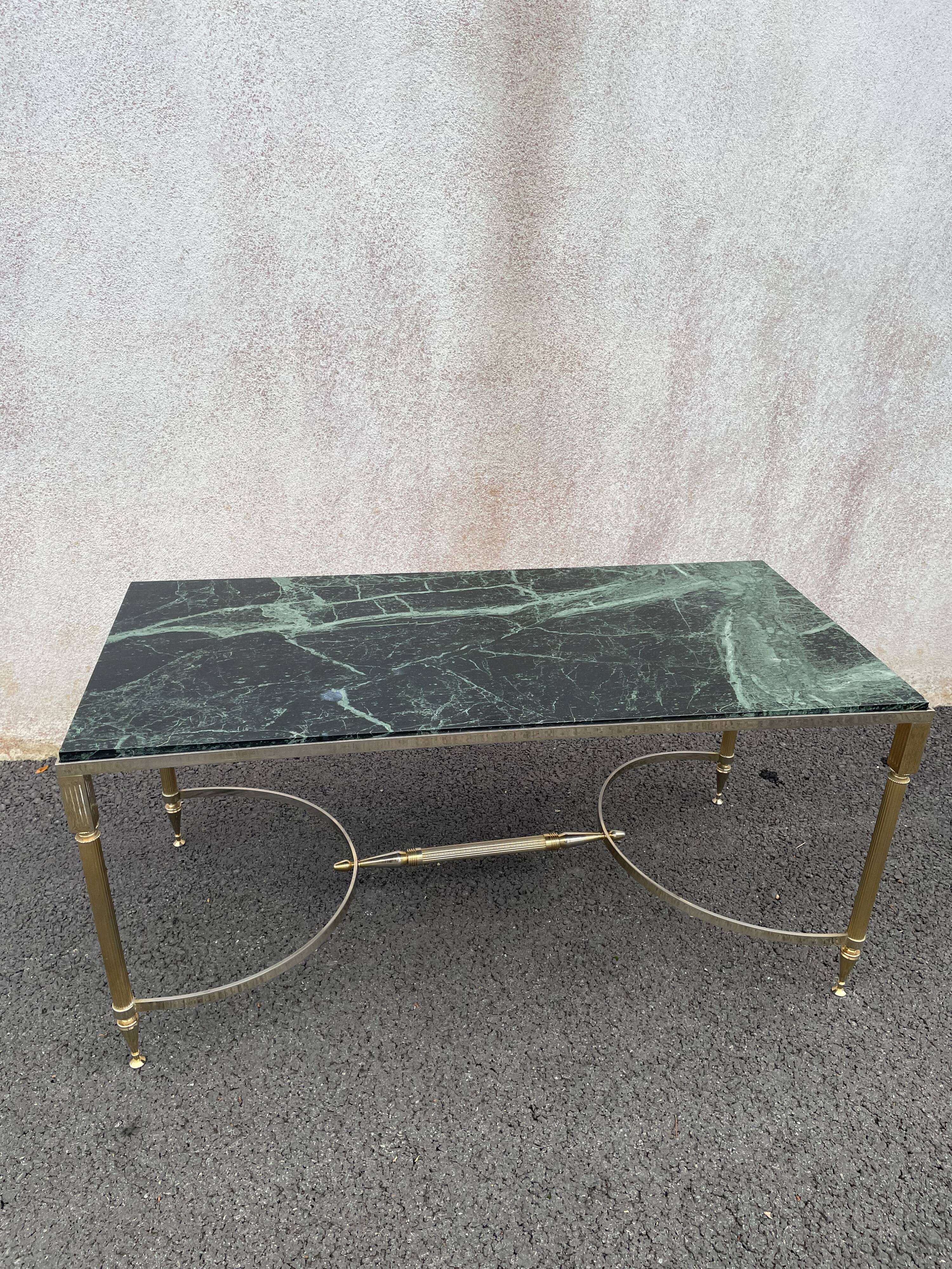 Coffee table in gilded brass and veined green marble