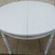 Round cherry wood table extendable to 210 cm without its extensions, completely refurbished.