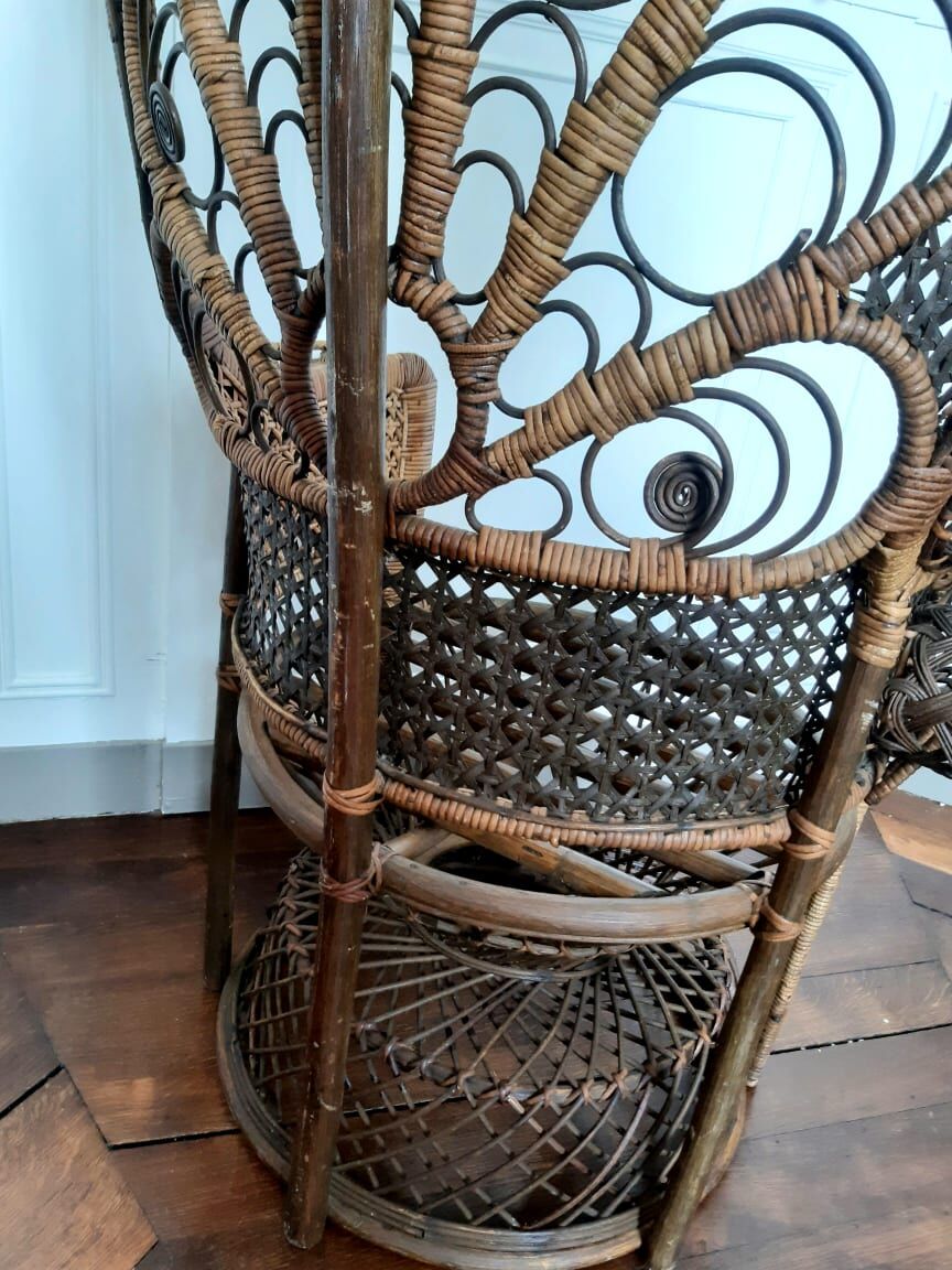 Peacock rattan armchair, circa 1960
