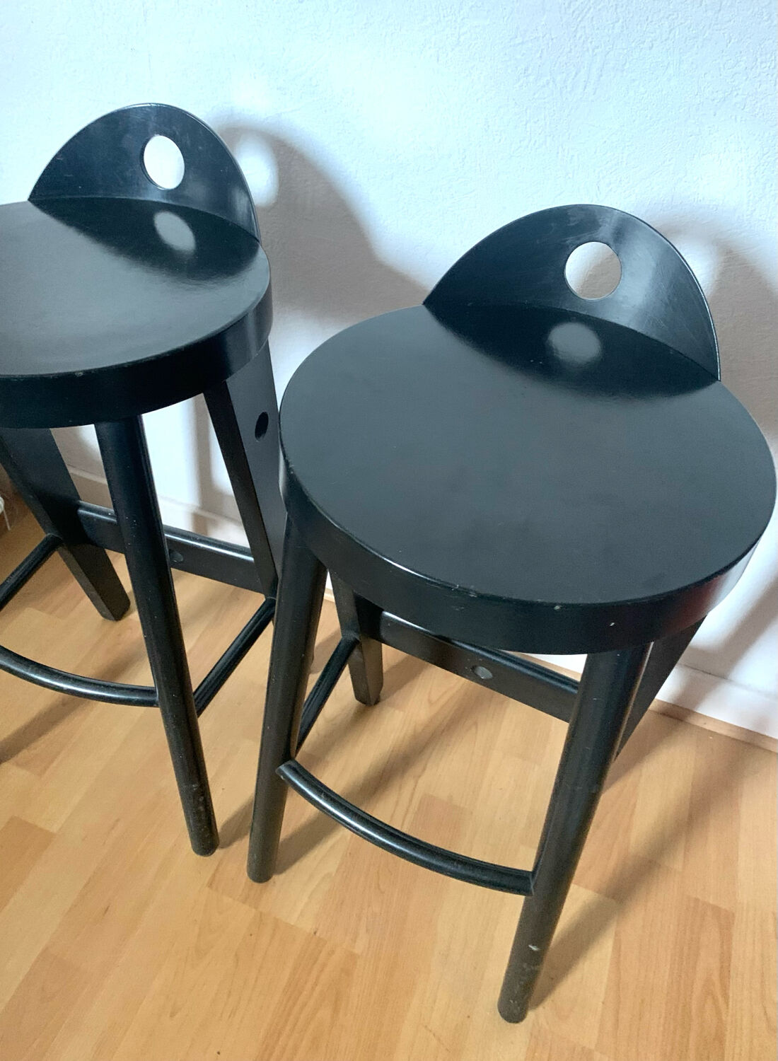 Pair of black designer stools by Baumann