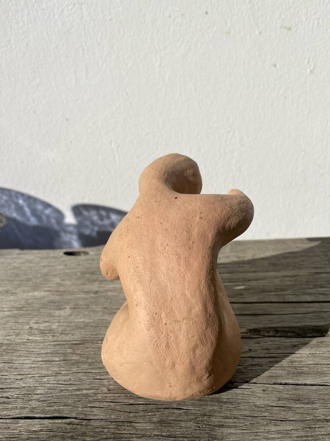 Terracotta sculpture figurine of a woman