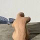 Terracotta sculpture figurine of a woman