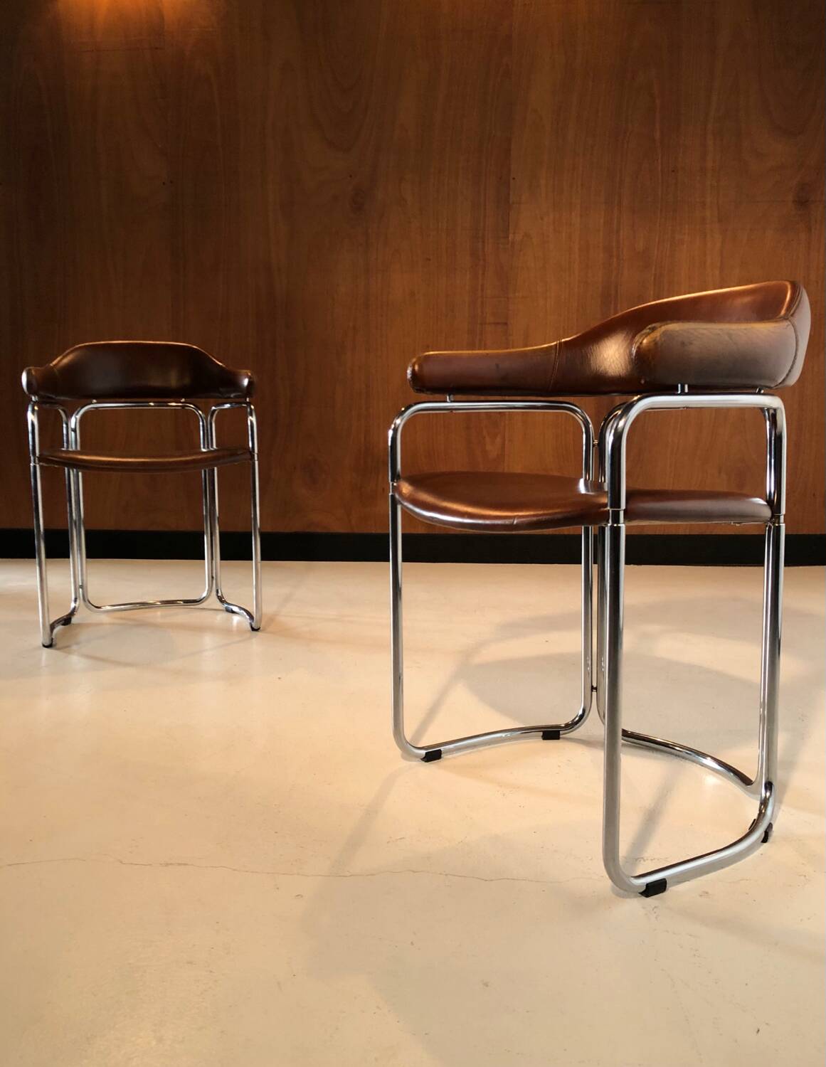 Pair of vintage armchairs, cognac leather and chrome steel 1970