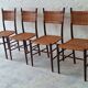 Four teak dining chairs with patinated cane after Gio Ponti, Italy 1960s