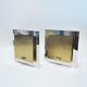 Pair of square metal and brass wall sconces