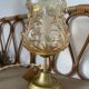 Table lamp with amber glass globe and brass base
