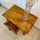 Old wooden bedside table