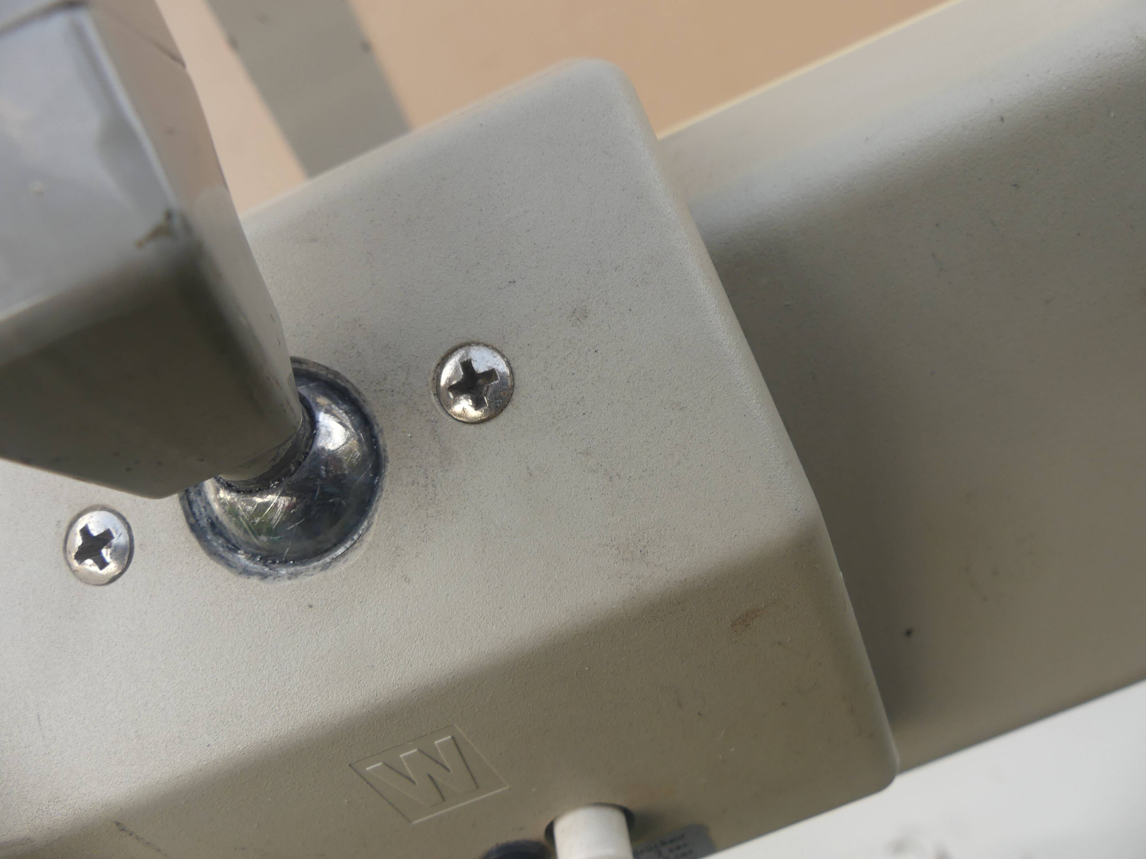WALDMANN articulated workshop lamp with two industrial clamp arms for architects.