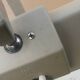 WALDMANN articulated workshop lamp with two industrial clamp arms for architects.