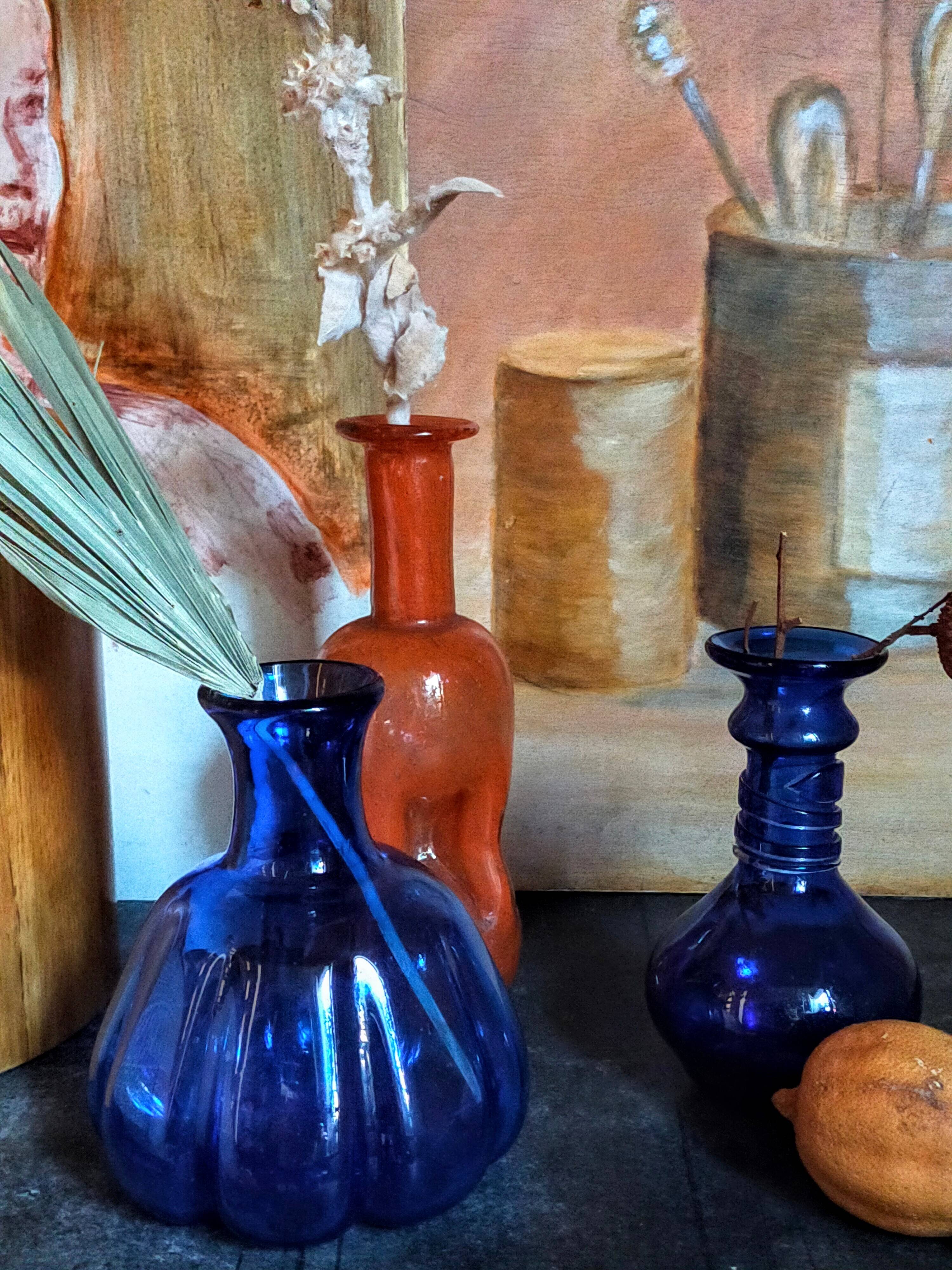Trio of vintage blown glass soliflore vases