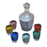 Liquor service consisting of a carafe and 6 small shot glasses, houndstooth pattern