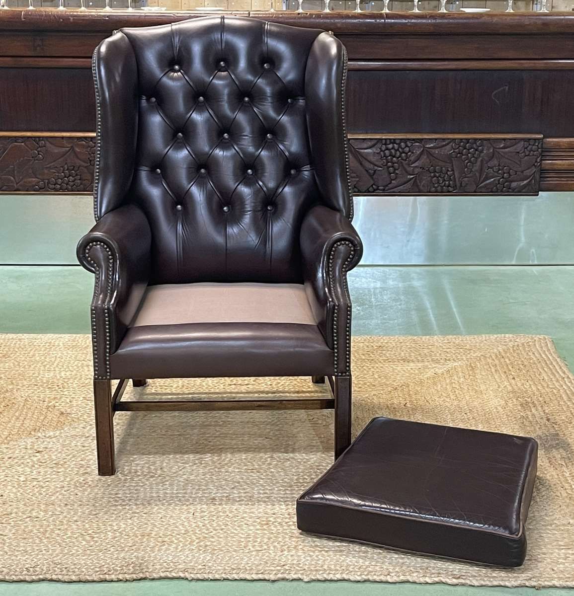 Chesterfield armchair with brown leather ears from the 1990s in very good condition