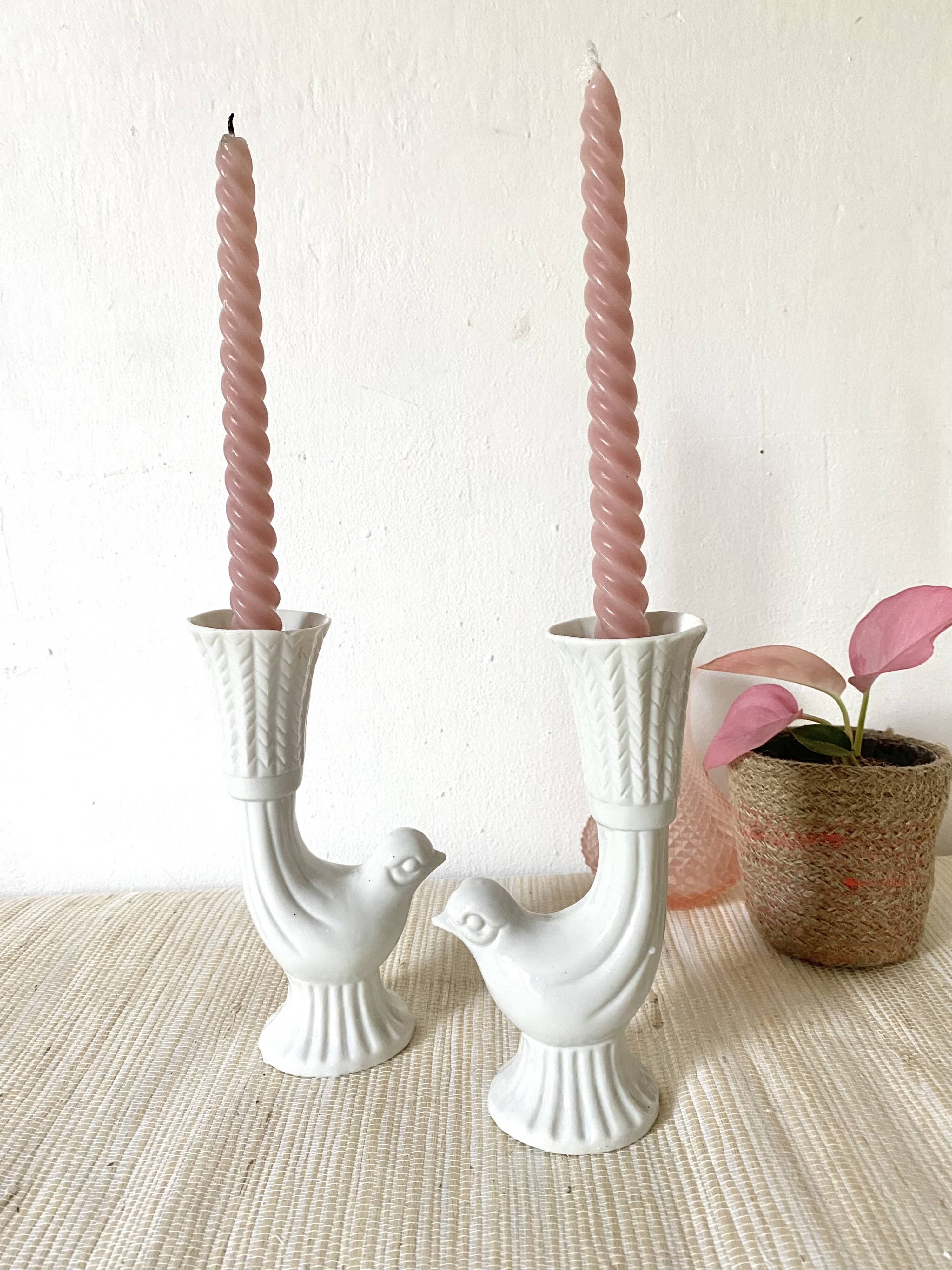 Pair of porcelain candle holders and bird vases