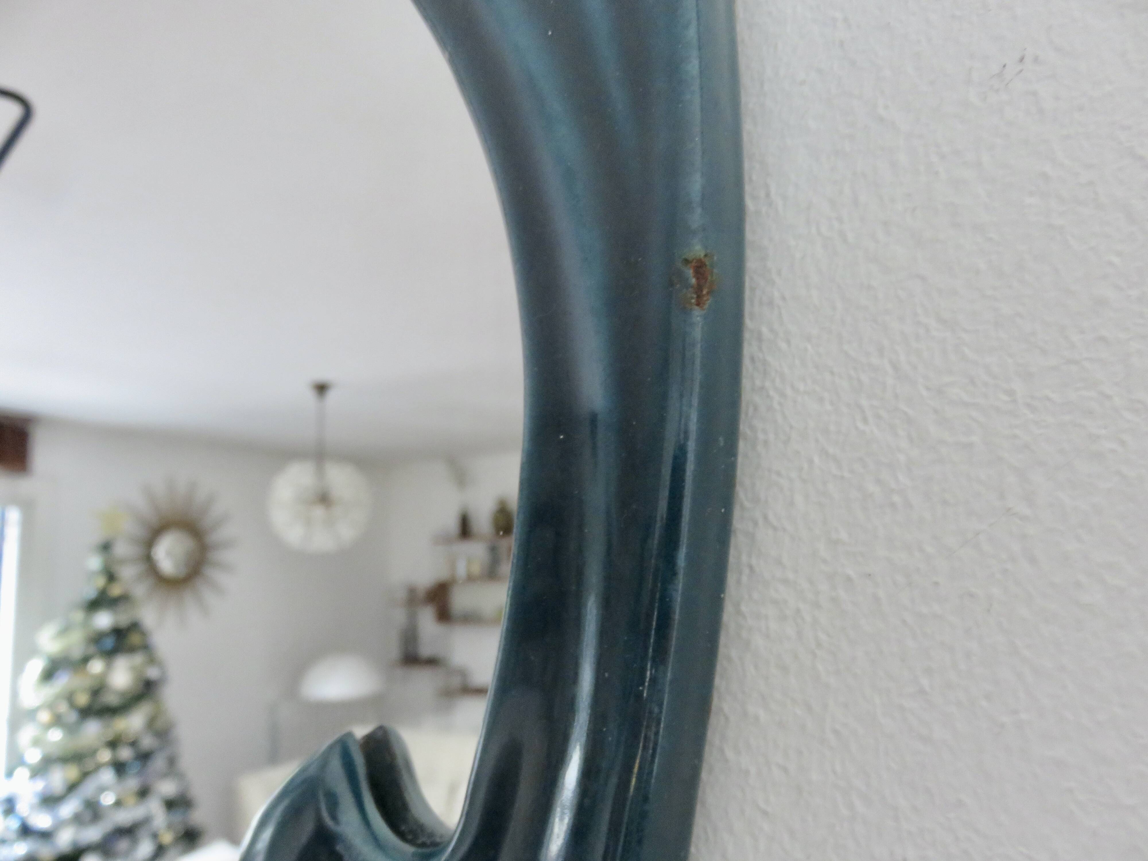 Art Nouveau mirror in blue enamelled cast iron in the style of Hector Guimard.