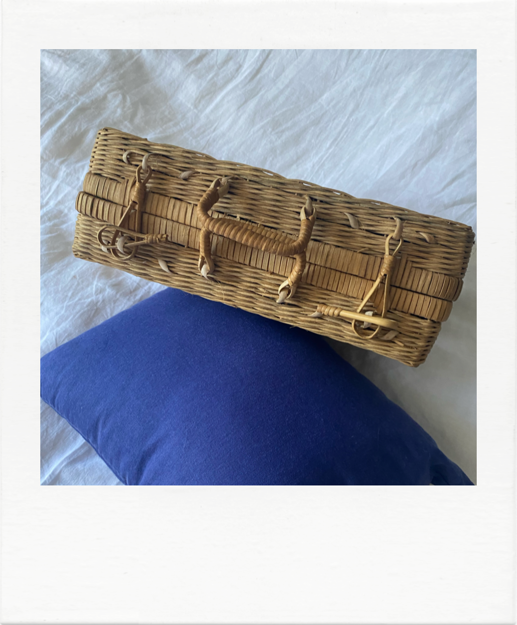 Vintage wicker suitcase