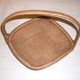 Flat diamond-shaped rattan basket with handle
