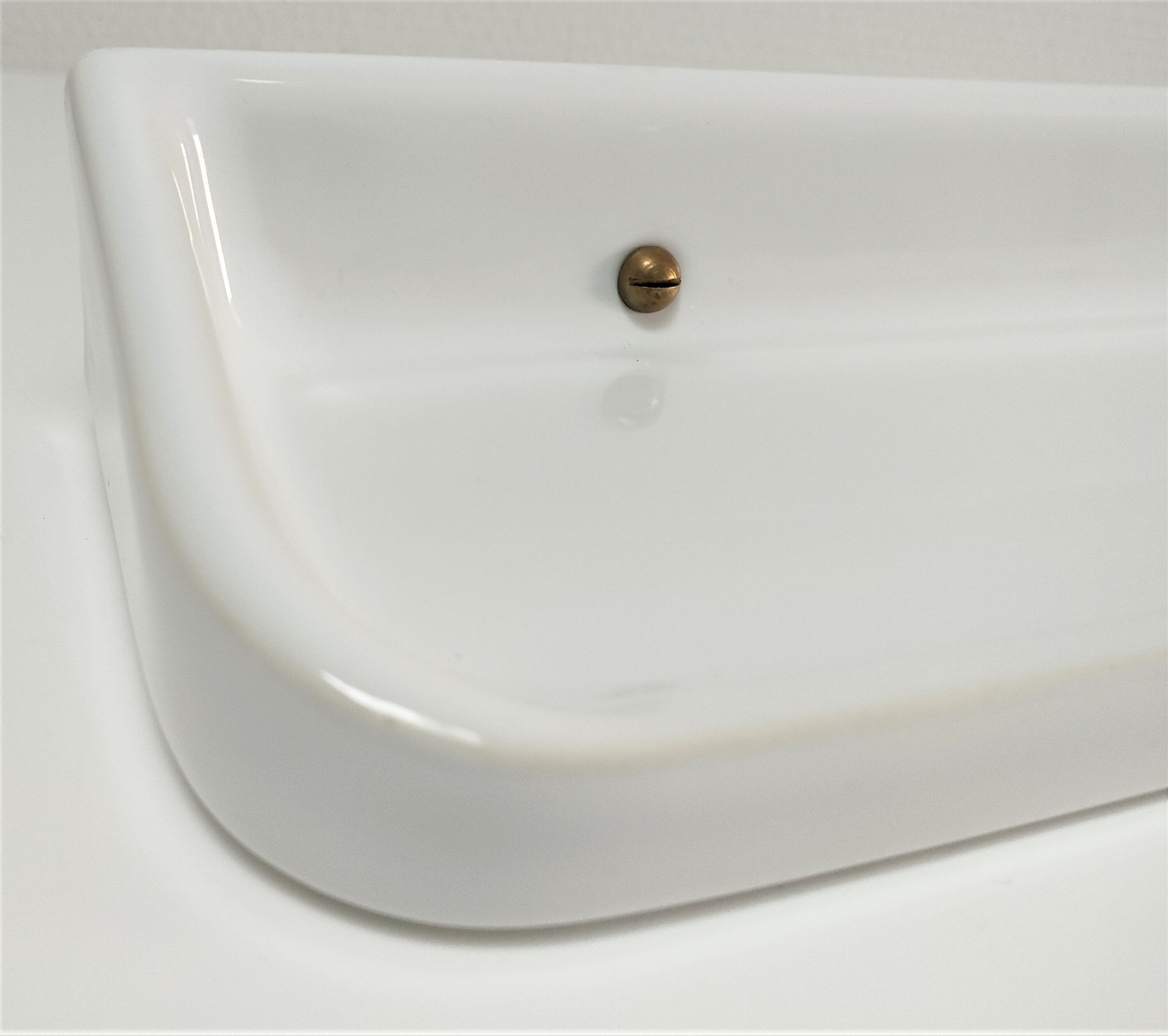 Vintage white glazed ceramic wall shelf